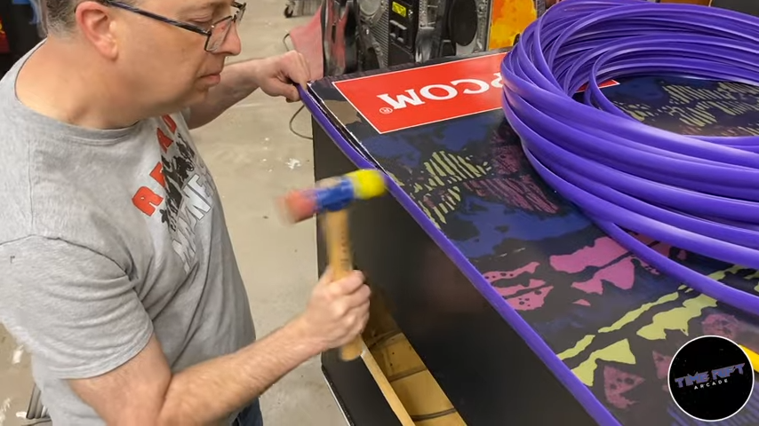 Applying Purple Arcade T-Molding