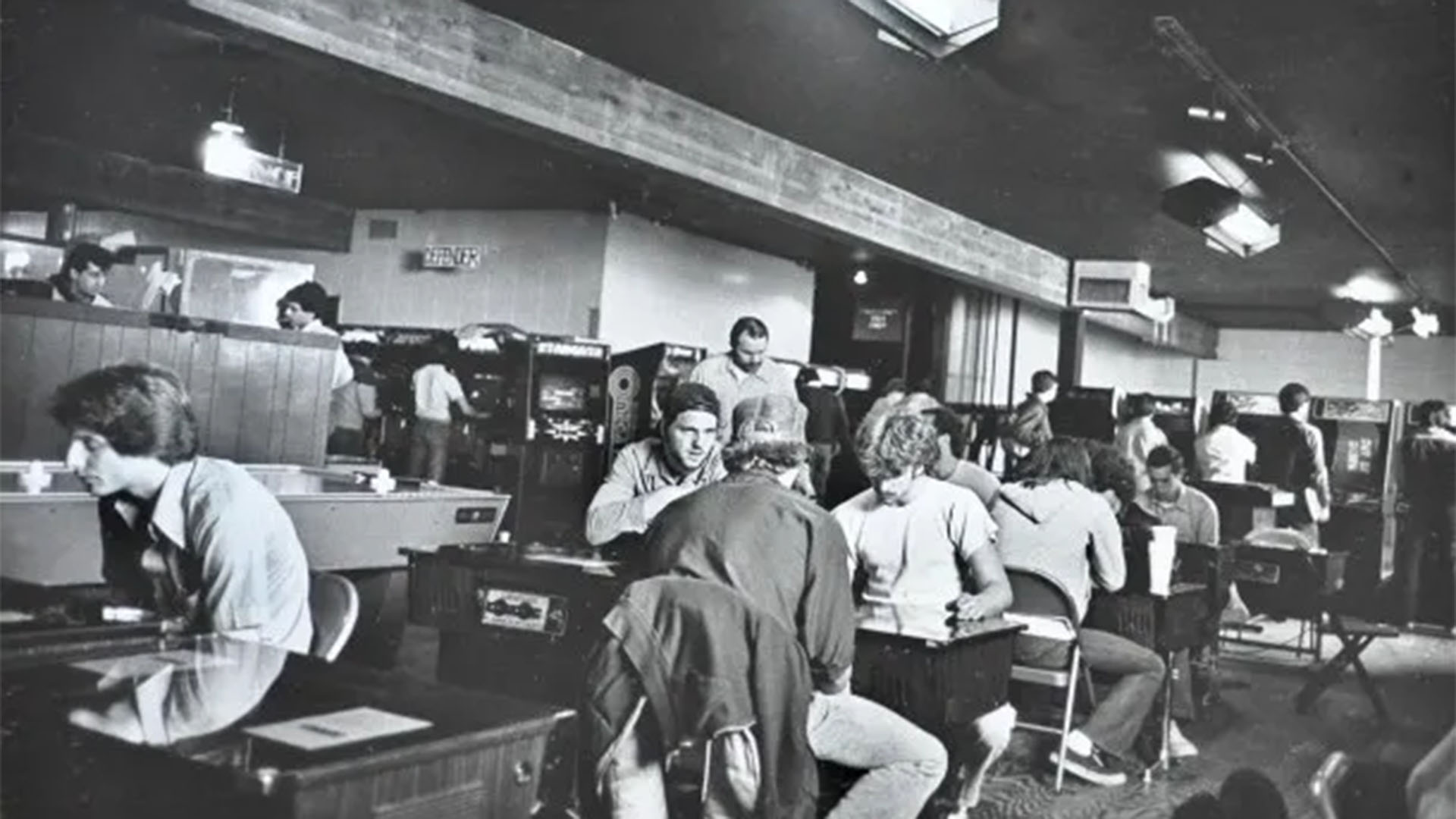 80s people playing cocktail tables